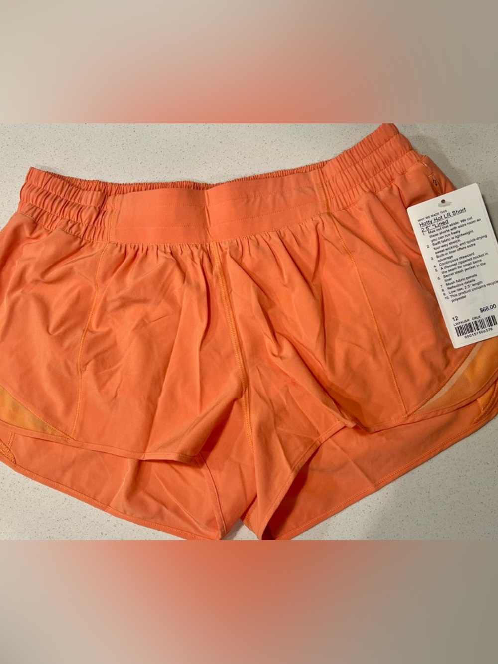 NWT • Lululemon • Hotty Hot Shorts • 2.5" inseam • Size 12 • Coral Kiss